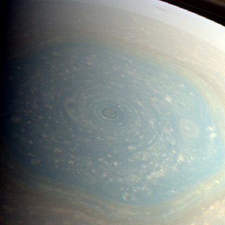 Illustration for article titled An absolutely incredible raw image of Saturn’s swirling north pole